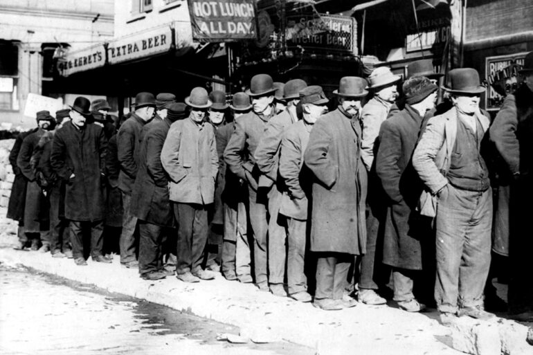 Bowery men waiting for bread in bread line, New York City, Bain Collection (LOC)